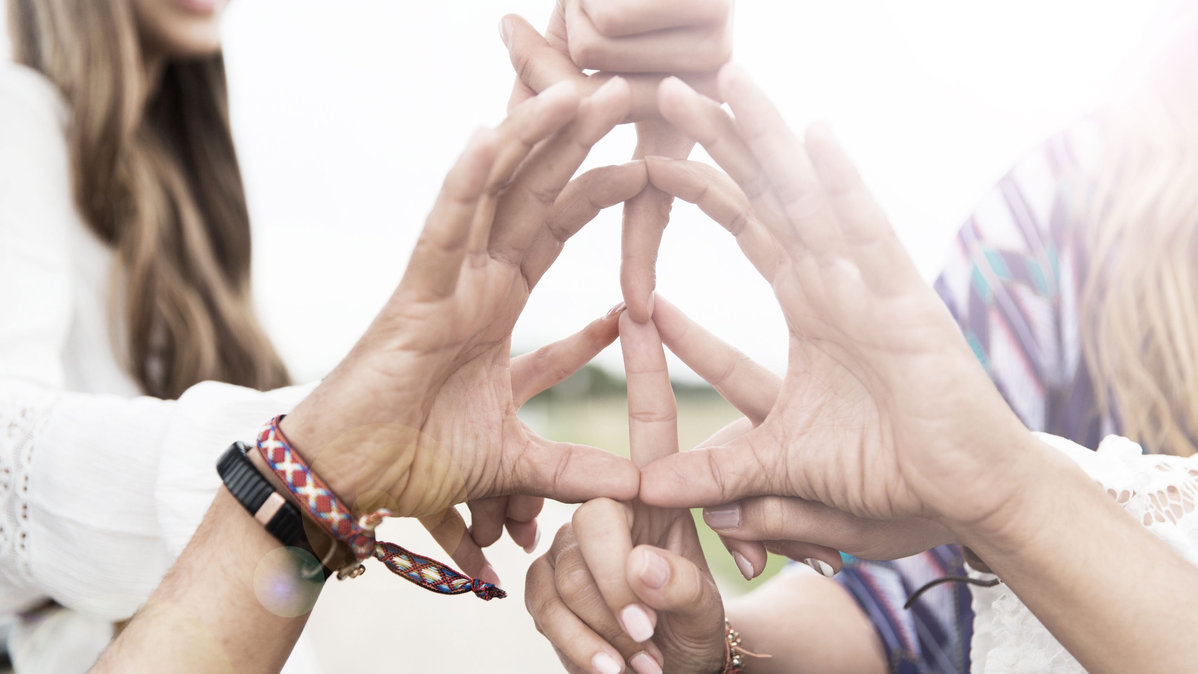 youth culture, gesture and people concept - close up of hippie friends showing peace hand sign outdoors