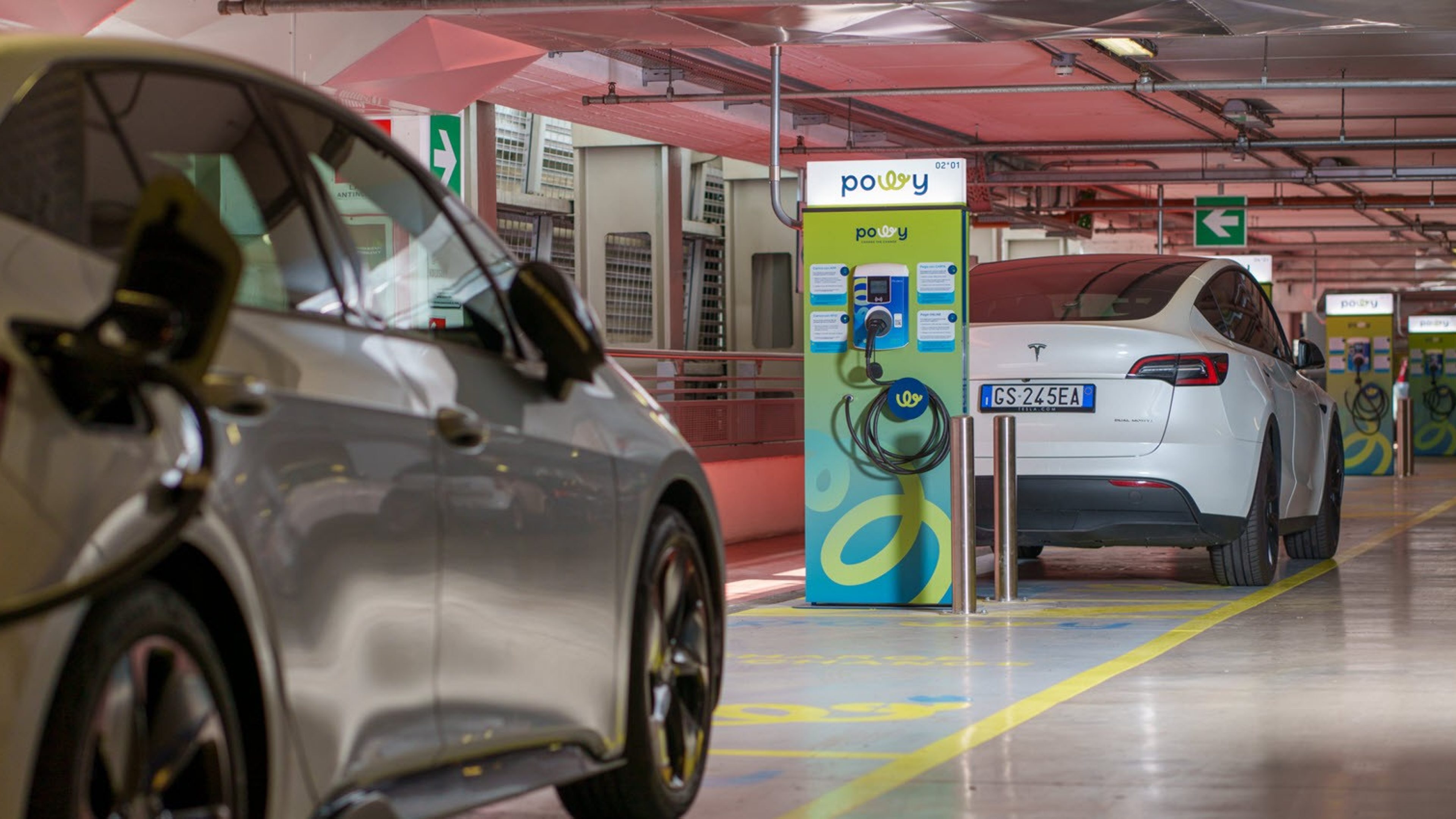 Electric cars charging at powy charging station 